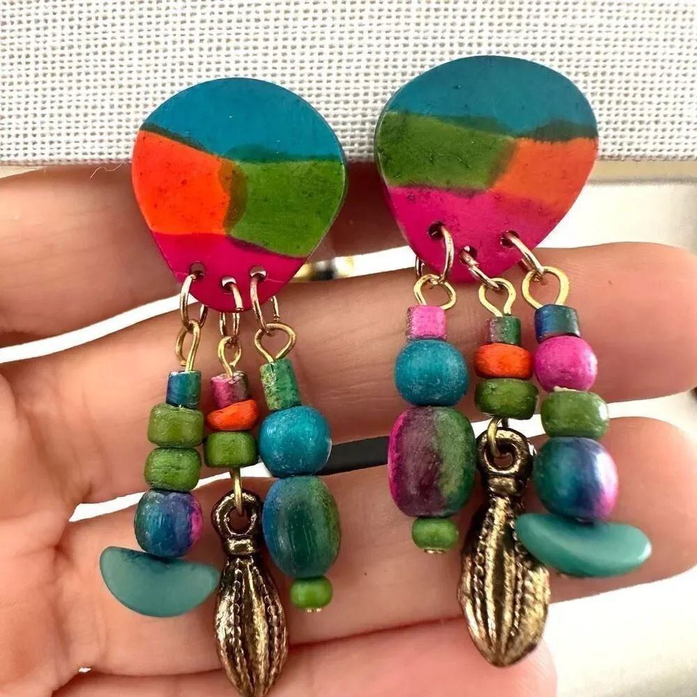 Multi colored dangling clip on earrings